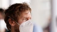 FILE PHOTO: Aston Martin's Sebastian Vettel wears a protective face mask during testing REUTERS/Albert Gea/File Photo
