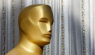 An Oscar statue is displayed on the red carpet during the Oscars arrivals at the 94th Academy Awards in Hollywood, Los Angeles, California, U.S., March 27, 2022. REUTERS/Mike Blake
