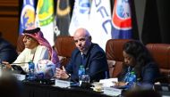 FIFA President Gianni Infantino (centre) with FIFA Senior Vice-President Sheikh Salman bin Ebrahim Al Khalifa (left) and FIFA Secretary General Fatma Samoura during a FIFA Council Meeting in Doha, yesterday.