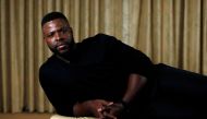 Cast member Winston Duke poses for a portrait while promoting the movie 