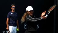 Melbourne Park, Melbourne, Australia, February 16, 2021 Serena Williams of the U.S. and her coach Patrick Mouratoglou during a practice session REUTERS/Loren Elliott/File Photo