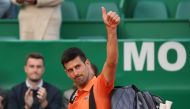 April 12, 2022 Serbia's Novak Djokovic acknowledges spectators as he walks off the court after losing his second round match against Spain's Alejandro Davidovich Fokina REUTERS/Denis Balibouse