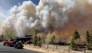 Smoke drifts from the Tunnel Fire north of Flagstaff, Arizona April 19, 2022 in a still image from video. Image taken April 19, 2022. REUTERS/Reuters TV