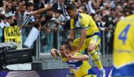 Juventus' Leonardo Bonucci celebrates scoring their first goal with Alvaro Morata REUTERS/Massimo Pinca