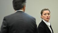 Actor Amber Heard looks stands in the courtroom at Fairfax County Circuit Court during a defamation case against her by actor Johnny Depp, her ex-husband, in Fairfax, Virginia, U.S., May 3, 2022. Jim Watson/Pool via REUTERS