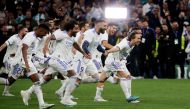 Real Madrid's Luka Modric, Karim Benzema and teammates celebrate after the match REUTERS/Isabel Infantes

