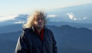 Musician Brian May looks on while shooting a music video on the island of La Palma, Spain in this undated handout image. Richard Gray/Duck Productions/Handout via REUTERS