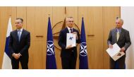 Finland's Ambassador to NATO Klaus Korhonen, NATO Secretary-General Jens Stoltenberg and Sweden's Ambassador to NATO Axel Wernhoff attend a ceremony to mark Sweden's and Finland's application for membership in Brussels, Belgium, May 18, 2022. Reuters/Johanna Geron/Pool
