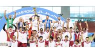 Qatar Olympic Committee President H E Sheikh Joaan bin Hamad Al Thani with the winners of boys events at the conclusion of the 15th Schools Olympic Program at the Aspire Dome, yesterday.
