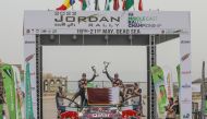 Qatar's Nasser Saleh Al Attiyah and his navigator Mathieu Baumel celebrate their victory.