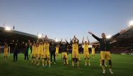 Ukraine players celebrate and applaud their fans after the match Action Images via Reuters/Lee Smith