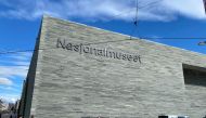 A woman walks outside of Norway's National Museum in Oslo, Norway, June 3, 2022. Reuters/Victoria Klesty