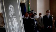 File photo: A mural by anonymous British street artist Banksy stolen from the Bataclan theatre in Paris and found in a farmhouse in central Italy is seen during the ceremony to return to France at the French embassy in Rome, Italy. July 14, 2020. Reuters/Yara Nardi/File Photo