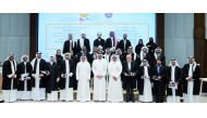 Qatar Olympic Committee (QOC) President H E Sheikh Joaan bin Hamad Al Thani poses for group photo with Qatar Olympic Academy (QOA) graduates yesterday. QOC Secretary-General Jassim Rashid Al Buenain, Qatar Swimming Association President Khaleel Al Jabir, Qatar Stars League CEO Hani Taleb Ballan and QOA’s Executive Director Saif Mohammed A H Al Naemi also attended the graduation ceremony.  