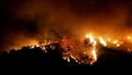 A forest fire is seen in Benahavis, Spain. June 8, 2022. REUTERS/Jon Nazca TPX IMAGES OF THE DAY
