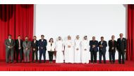 Officials pose for a group photo during the event.