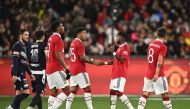 Manchester United players celebrate their first goal scored by Scott McTominay. (Joel Carrett/AAP/REUTERS)