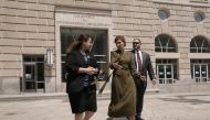 Olena Zelenska, wife of Ukraine's President Volodymyr Zelenskiy speaks with Ukrainian Ambassador to the US Oksana Markarova, after attending a meeting at the US Agency for International Development building in Washington, US, July 18, 2022. (REUTERS/Ken Cedeno)