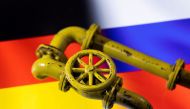3D printed Natural Gas Pipes are placed on displayed German and Russian flags in this illustration taken, January 31, 2022. REUTERS/Dado Ruvic/Illustration

