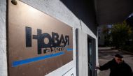 Russian investigative newspaper Novaya Gazeta's plate is seen next to an entrance to the office in Moscow October 8, 2021. REUTERS/Maxim Shemetov/File Photo
