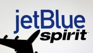 File Photo: Airplane model is placed on displayed Spirit Airlines and JetBlue Airways logos in this illustration taken June 21, 2022. (REUTERS/Dado Ruvic)

