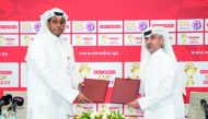 Ooredoo and QSL officials during the ceremony. 