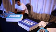Souvenirs of Conservative leadership candidates Rishi Sunak and Liz Truss lie at a stand on a hustings event, part of the Conservative party leadership campaign, in Leeds, Britain July 28, 2022. (REUTERS/Henry Nicholls)