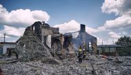 Firefighters work at a site of residential house destroyed by a Russian missile strike, as Russia's attack on Ukraine continues, in Kramatorsk, Ukraine July 29, 2022. Press service of the Donetsk Regional Military Administration/Handout via REUTERS