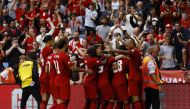 Liverpool's Darwin Nunez celebrates scoring their third goal with teammates (Reuters/Andrew Boyers)