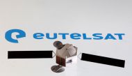 A satellite model is placed on Eutelsat logo in this picture illustration taken April 4, 2022. REUTERS/Dado Ruvic/Illustration/

