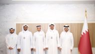 Minister of Sports and Youth H E Salah bin Ghanem Al Ali with the Advisor to H E Minister and President of the Sports for All Federation Abdulrahman Musallam Al Dosari and Qatari triathletes who took part in the Arch to Arc Triathlon.