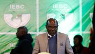 Independent Electoral and Boundaries Commission (IEBC) chairman Wafula Chebukati addresses delegates on the general election, the IEBC National Tallying centre at the Bomas of Kenya, in Nairobi, Kenya August 11, 2022. REUTERS/Monicah Mwangi REFILE - CORRECTING INFORMATION