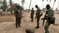 File Photo: Naval officers inspect an illegally-dug oil well at ilashe in Lagos, Nigeria, January 23, 2020. (REUTERS/Temilade Adelaja)