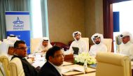Aamal’s Chairman Sheikh Faisal bin Qassim Al Thani, and CEO Rashid bin Ali Al Mansoori, with other officials, during the meeting in Doha, recently. 