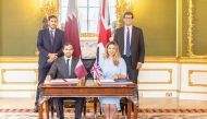 Minister of Commerce and Industry H E Sheikh Mohammed bin Hamad bin Qassim Al Thani and H E Ranil Jayawardena, Minister for International Trade in the United Kingdom witnessing the signing of the minutes of the third session of the Qatar-UK Joint Economic & Trade Committee, in London yesterday.
