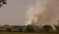 Smoke rises following recent Russian shelling, as Russia's attack in Ukraine continues, in Pazeno area, in Donetsk region, Ukraine August 28,2022. REUTERS/Ammar Awad