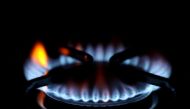 Flames come out of a domestic gas ring of an oven in Durham, Britain, September 23, 2021. Reuters/Lee Smith/File Photo