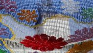 A detail view of a canopy created with recycled material displayed over the main square of Valverde de la Vera as part of the 