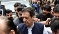 Pakistan's former Prime Minister Imran Khan, who is facing terrorism charges, appears in court to extend pre-arrest bail, in Islamabad, Pakistan, on August 25, 2022. REUTERS/Waseem Khan/File Photo