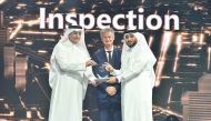 Minister of Communications and Information Technology H E Mohammed bin Ali Al Mannai presents the award to Ali Khaled Al Khulaifi, Director of Planning and Quality Department and Acting Director of Information Technology Department at MoCI, while President of Microsoft EMEA Ralph Haupter looks on, during the ceremony in Doha, recently.  