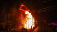 Firefighters work at the site of 5th thermal power plant damaged by a Russian missile strike, amid Russia's attack on Ukraine, in Kharkiv, Ukraine September 11, 2022. REUTERS/Vyacheslav Madiyevskyy
 