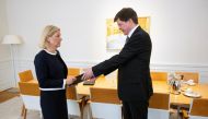 Sweden's Speaker of the Parliament Andreas Norlen receives Prime Minister Magdalena Andersson and accepts her formal resignation, in Stockholm, Sweden on September 15, 2022. TT News Agency/Henrik Montgomery via REUTERS