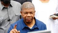 Angola's President and leader of the People's Movement for the Liberation of Angola (MPLA) ruling party, Joao Lourenco, gestures after castsing his vote in the general election in the capital Luanda, Angola, on August 24, 2022. REUTERS/Siphiwe Sibeko