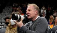 Phoenix Suns owner Robert Sarver takes images during a game against the Houston Rockets at Footprint Center, Phoenix, Arizona, on February 16, 2022. (Rick Scuteri-USA TODAY via Reuters)