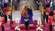 King Charles III, the Princess Royal, the Duke of York and the Earl of Wessex hold a vigil beside the coffin of their mother, Queen Elizabeth II, as it lies in state on the catafalque in Westminster Hall, at the Palace of Westminster, London, on September 16, 2022. (Yui Mok/Pool via REUTERS)