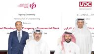 Ibrahim Jassim Al Othman, UDC President, Chief Executive Officer and Member of the Board, Joseph Abraham, Group Chief Executive Officer of Commercial Bank, Hussain Akbar Al Baker, UDC Executive Director Commercial, and Hussein Al Abdulla, Commercial Bank EGM, Chief Marketing Officer and Head of Premium Banking, during the MoU signing ceremony in Doha. 