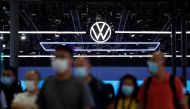 People walk past the Volkswagen booth at the Beijing International Automotive Exhibition, or Auto China show, in Beijing, China on September 26, 2020. File Photo / Reuters
