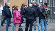 Men drafted into the Russian army during partial mobilisation say goodbye to their relatives and acquaintances outside a military commissariat in Moscow on September 23, 2022. Moscow News Agency/Handout via REUTERS