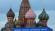 A view shows a banner on a screen, set up ahead of an expected ceremony and concert to declare four Ukraine's self-proclaimed regions part of Russia following recent referendums, near St. Basil's Cathedral in central Moscow, Russia, on September 29, 2022.