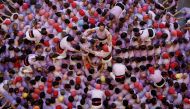 Colla Jove Xiquets de Tarragona start to form a human tower called 